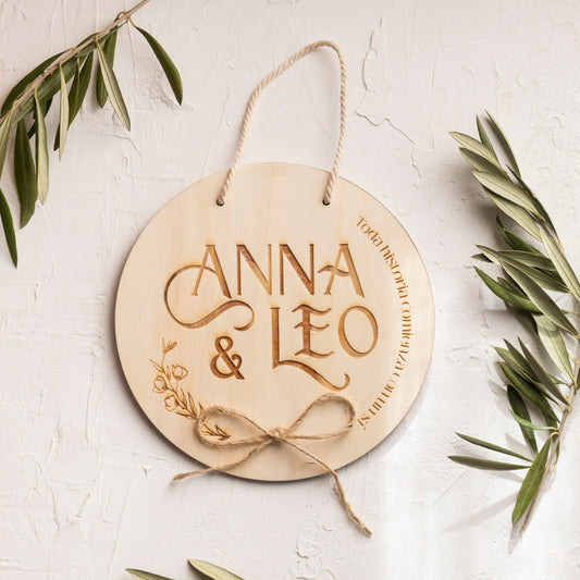 Letrero de madera porta anillos.